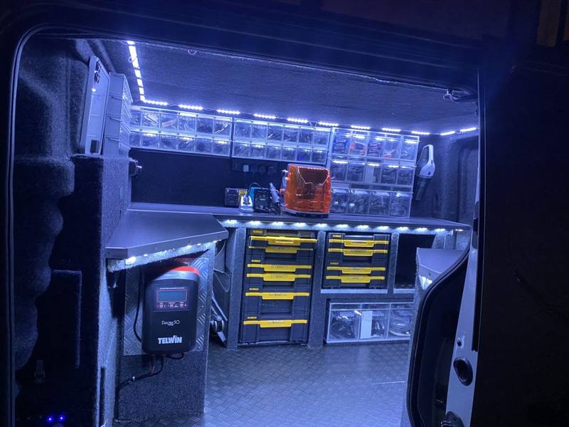 Inside the van: a fitted workshop with key blanks, programming kit and tools